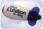Fly in the sky -
Advertising blimps spheres special shapes.